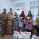 Wakil Bupati Kampar Dr.Misharti.S.Ag.M.Si Serahkan Bantuan Sembako Dari Bapanas di Desa Sawah